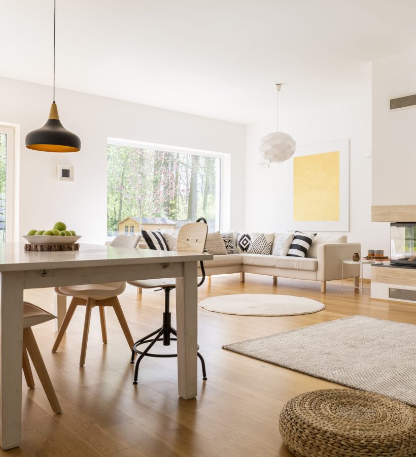 Wooden white dining table in modern designed living room